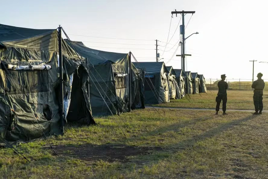 110422801-file-eds-photo-has-been-reviewed-by-us-military-censors-a-tent-city-not-far-from-th