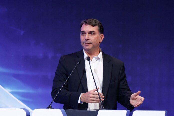 115388895-brazilian-senator-and-presidential-hopeful-flavio-bolsonaro-speaks-during-the-event-in-1-