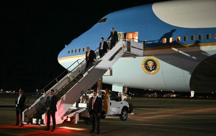 115595514-us-president-donald-trump-disembarks-from-air-force-one-upon-arrival-at-royal-air-force-ra