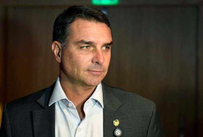 114998763-files-brazilian-senator-and-pre-presidential-candidate-flavio-bolsonaro-looks-on-as-he