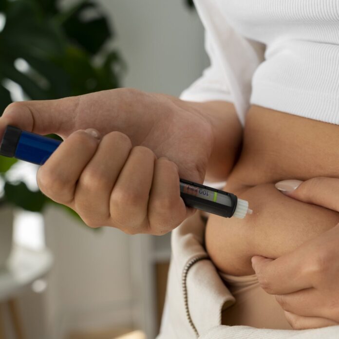 side-view-diabetic-woman-checking-her-glucose-level-1400x1400